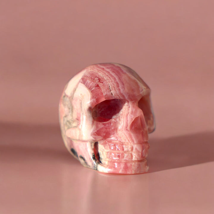 Hand-carved Rhodochrosite Skull - Enchantia Muse