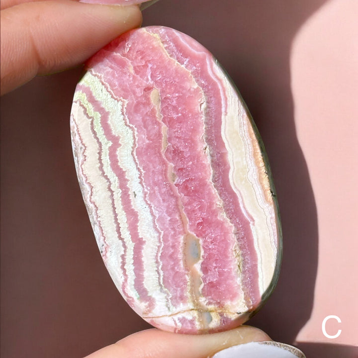 High Quality Rhodochrosite Flat Palm Stone - Enchantia Muse