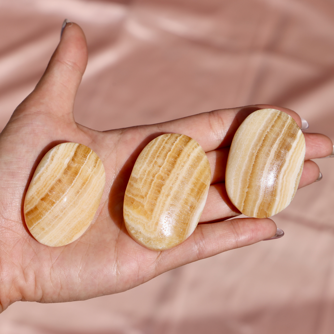 Banded Yellow Calcite Palm Stone - Enchantia Muse