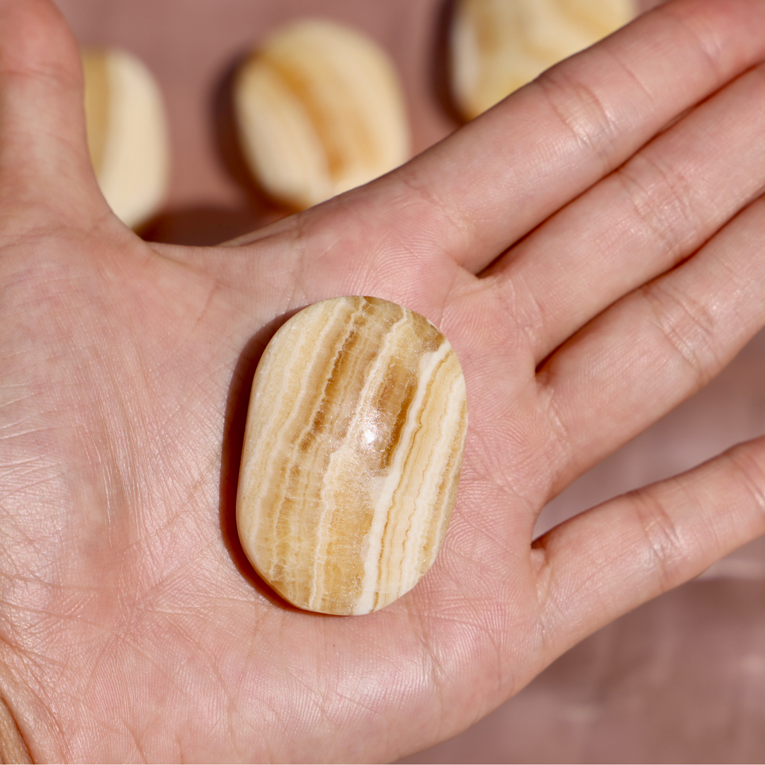 Banded Yellow Calcite Palm Stone - Enchantia Muse