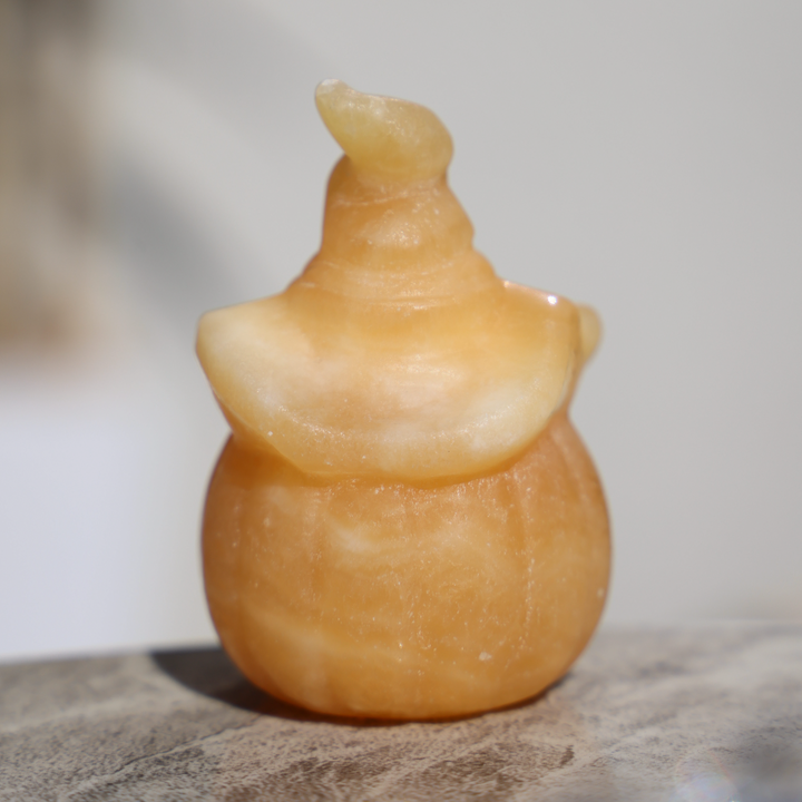 Hand-carved Yellow Calcite Pumpkin Ghost - Enchantia Muse