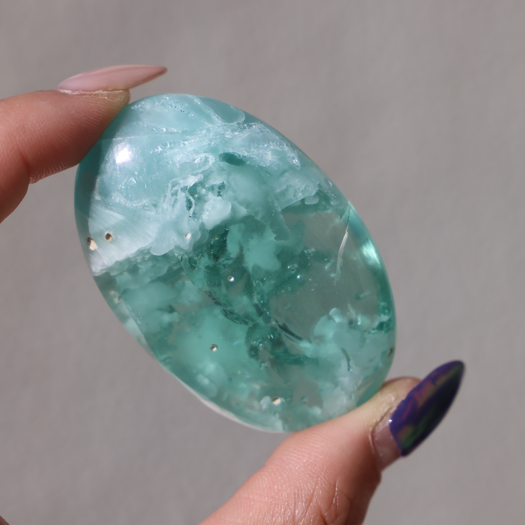 Hemimorphite glass palm stone