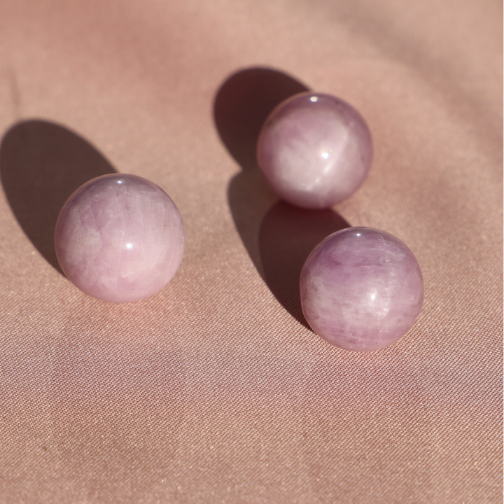 Kunzite Spheres with Cats Eye Flash