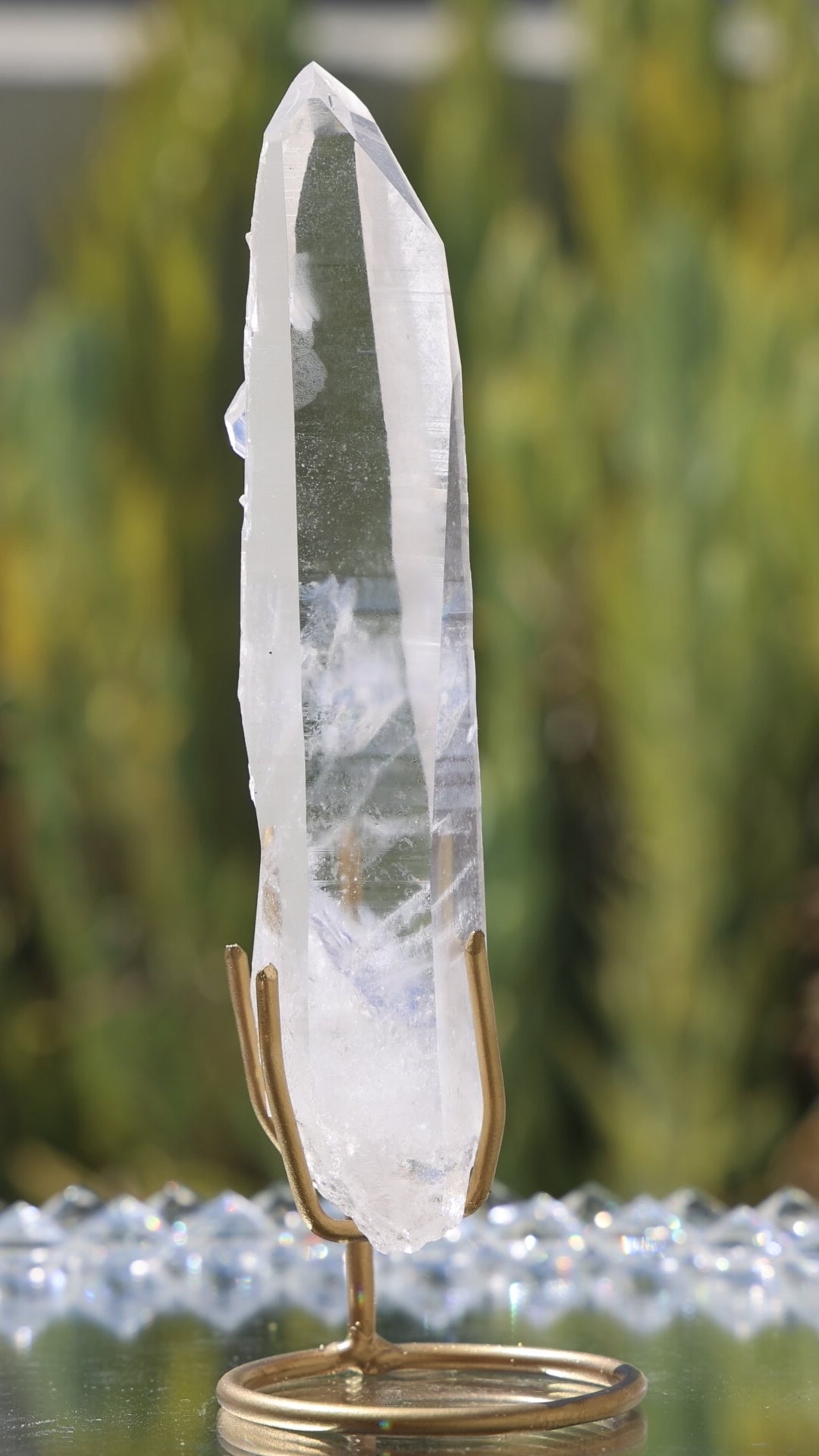 Clear Lemurian Quartz Point on Stand